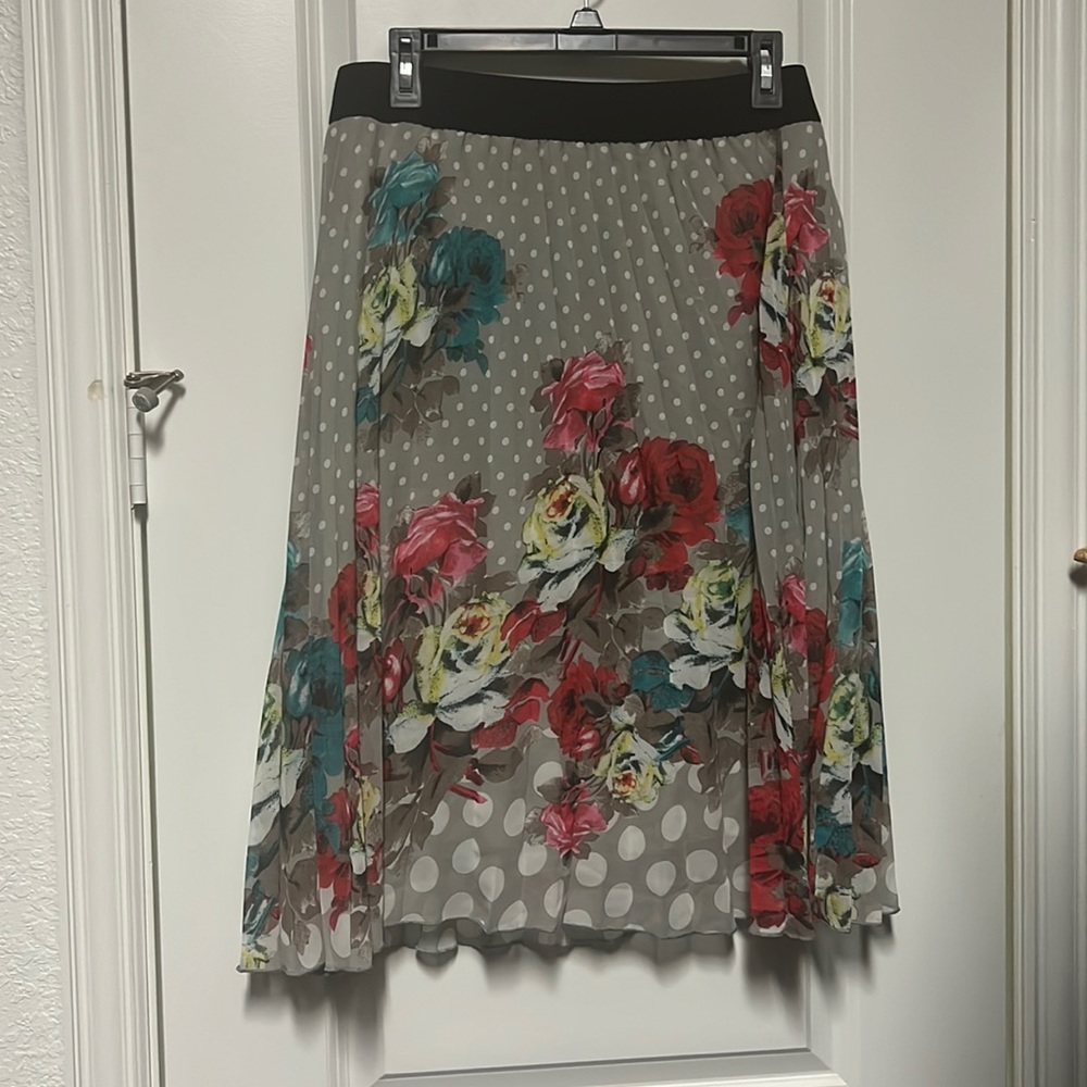 Cute flower and polka dot skirt!